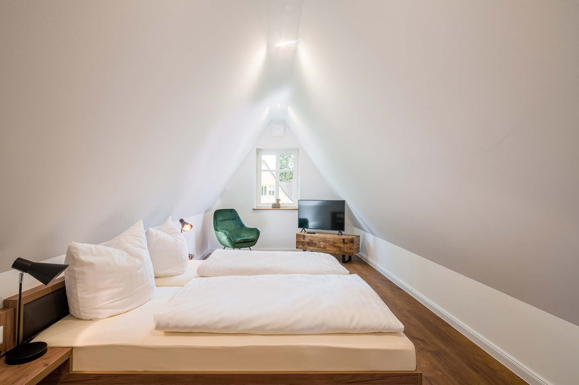 Schlafzimmer im Spitzboden in Wohnung 5